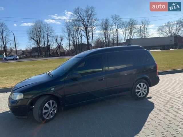 Черный Опель Астра, объемом двигателя 1.7 л и пробегом 176 тыс. км за 1550 $, фото 7 на Automoto.ua
