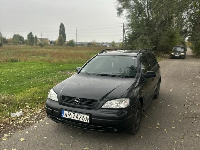 Черный Опель Астра, объемом двигателя 2 л и пробегом 258 тыс. км за 952 $, фото 10 на Automoto.ua