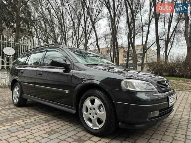 Черный Опель Астра, объемом двигателя 2 л и пробегом 340 тыс. км за 3900 $, фото 6 на Automoto.ua