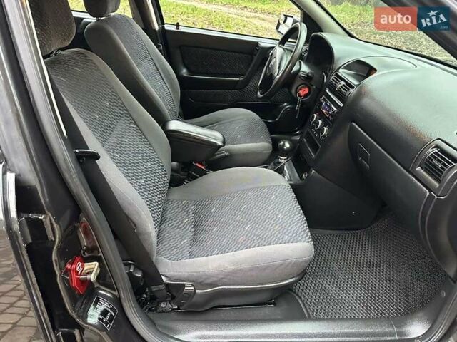 Черный Опель Астра, объемом двигателя 2 л и пробегом 340 тыс. км за 3900 $, фото 54 на Automoto.ua