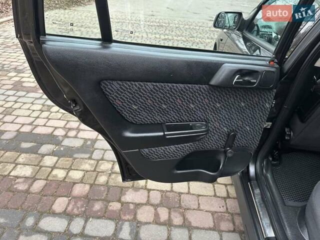 Черный Опель Астра, объемом двигателя 2 л и пробегом 340 тыс. км за 3900 $, фото 78 на Automoto.ua