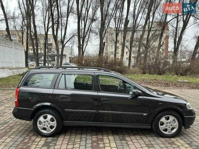 Черный Опель Астра, объемом двигателя 2 л и пробегом 340 тыс. км за 3900 $, фото 15 на Automoto.ua