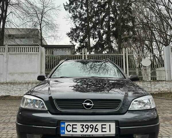 Черный Опель Астра, объемом двигателя 2 л и пробегом 340 тыс. км за 3900 $, фото 8 на Automoto.ua