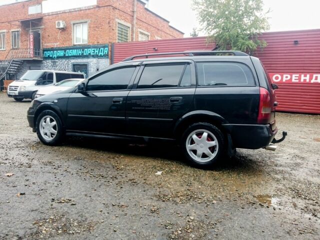 Черный Опель Астра, объемом двигателя 1.6 л и пробегом 350 тыс. км за 2650 $, фото 2 на Automoto.ua