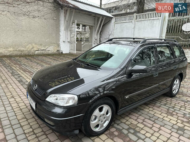 Черный Опель Астра, объемом двигателя 2 л и пробегом 337 тыс. км за 3850 $, фото 4 на Automoto.ua