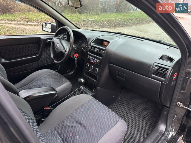 Черный Опель Астра, объемом двигателя 2 л и пробегом 337 тыс. км за 3850 $, фото 56 на Automoto.ua