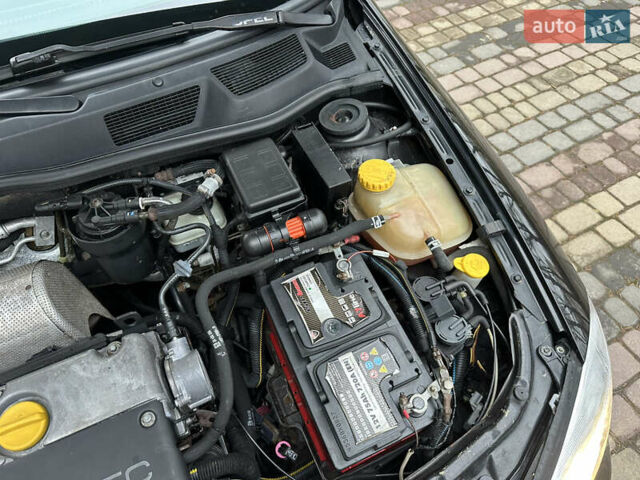 Черный Опель Астра, объемом двигателя 2 л и пробегом 337 тыс. км за 3850 $, фото 86 на Automoto.ua