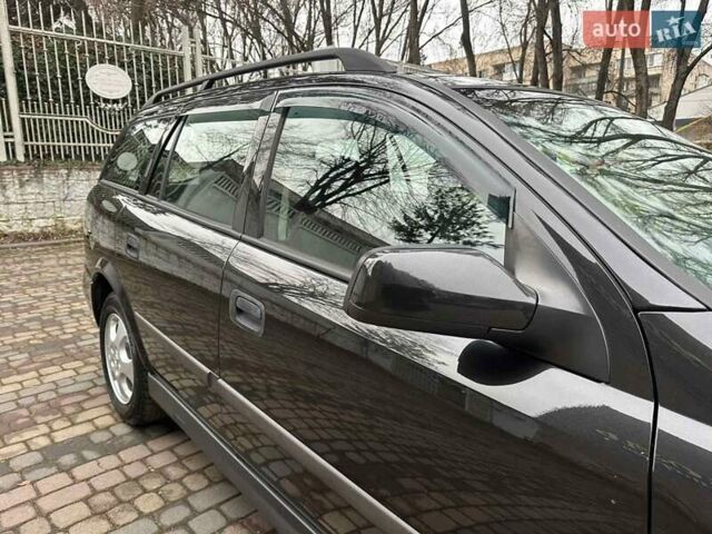 Черный Опель Астра, объемом двигателя 2 л и пробегом 340 тыс. км за 3900 $, фото 39 на Automoto.ua