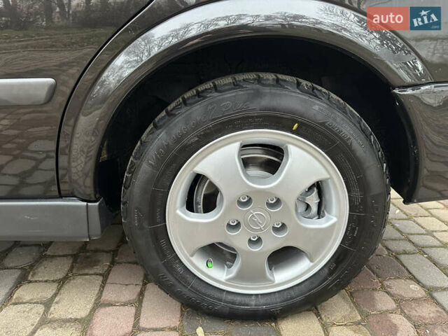 Черный Опель Астра, объемом двигателя 2 л и пробегом 337 тыс. км за 3850 $, фото 31 на Automoto.ua