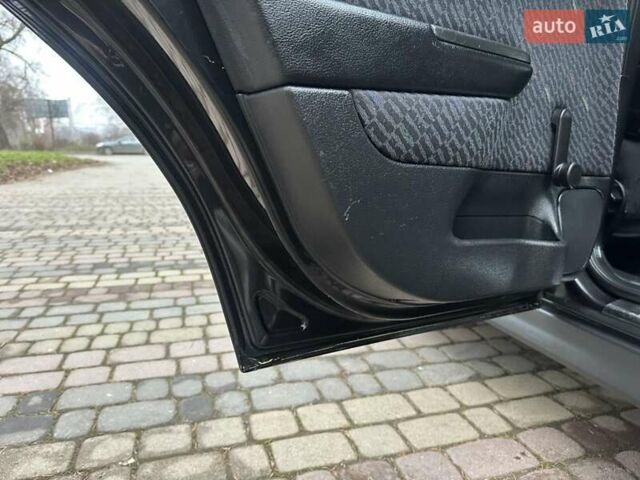 Черный Опель Астра, объемом двигателя 2 л и пробегом 340 тыс. км за 3900 $, фото 76 на Automoto.ua