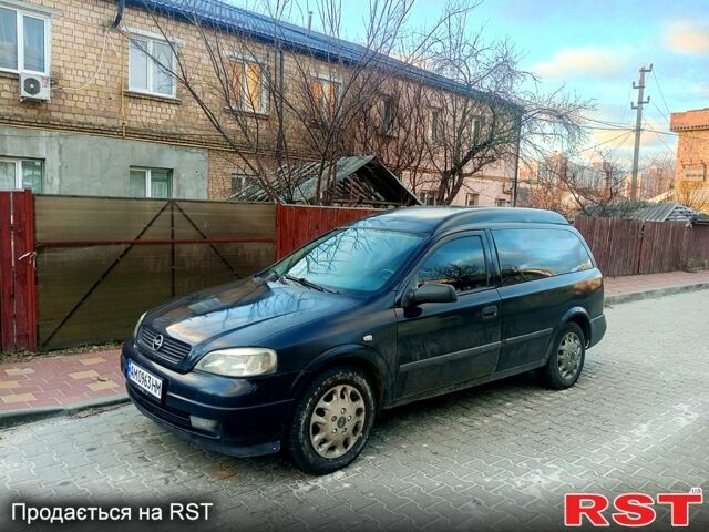 Черный Опель Астра, объемом двигателя 1.7 л и пробегом 300 тыс. км за 3500 $, фото 1 на Automoto.ua
