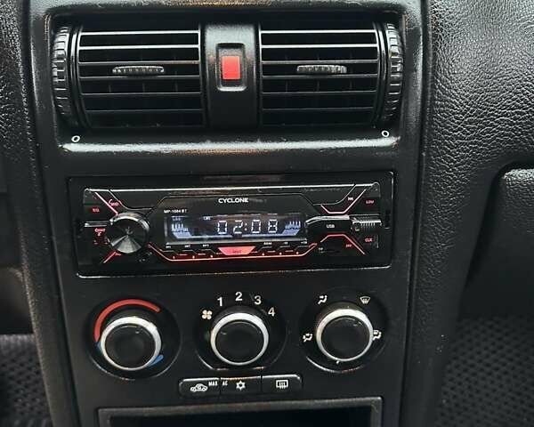 Черный Опель Астра, объемом двигателя 2 л и пробегом 340 тыс. км за 3900 $, фото 88 на Automoto.ua