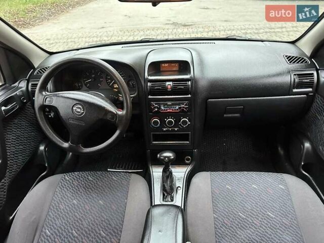 Черный Опель Астра, объемом двигателя 2 л и пробегом 340 тыс. км за 3900 $, фото 68 на Automoto.ua