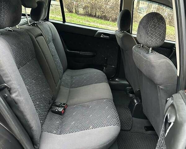 Черный Опель Астра, объемом двигателя 2 л и пробегом 340 тыс. км за 3900 $, фото 64 на Automoto.ua