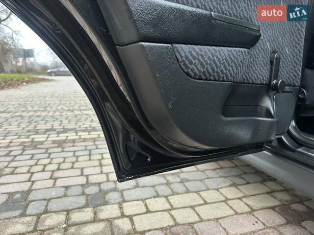 Черный Опель Астра, объемом двигателя 2 л и пробегом 337 тыс. км за 3850 $, фото 72 на Automoto.ua