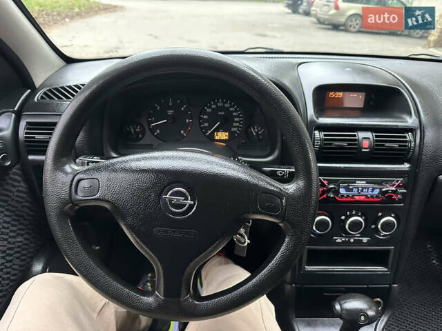 Черный Опель Астра, объемом двигателя 2 л и пробегом 337 тыс. км за 3850 $, фото 102 на Automoto.ua