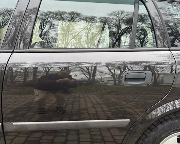 Черный Опель Астра, объемом двигателя 2 л и пробегом 337 тыс. км за 3850 $, фото 29 на Automoto.ua