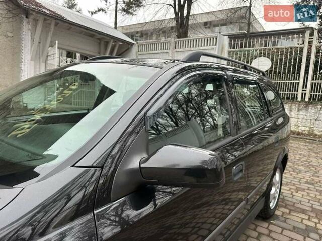 Черный Опель Астра, объемом двигателя 2 л и пробегом 340 тыс. км за 3900 $, фото 43 на Automoto.ua