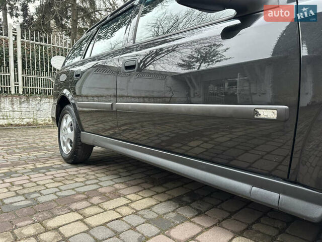 Черный Опель Астра, объемом двигателя 2 л и пробегом 337 тыс. км за 3850 $, фото 47 на Automoto.ua