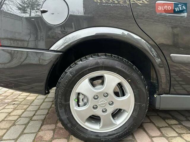 Черный Опель Астра, объемом двигателя 2 л и пробегом 340 тыс. км за 3900 $, фото 35 на Automoto.ua