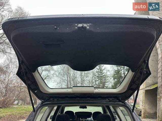 Черный Опель Астра, объемом двигателя 2 л и пробегом 337 тыс. км за 3850 $, фото 105 на Automoto.ua