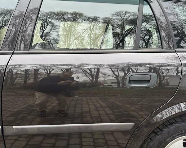 Черный Опель Астра, объемом двигателя 2 л и пробегом 340 тыс. км за 3900 $, фото 28 на Automoto.ua