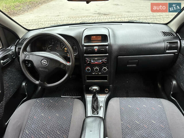 Черный Опель Астра, объемом двигателя 2 л и пробегом 337 тыс. км за 3850 $, фото 66 на Automoto.ua