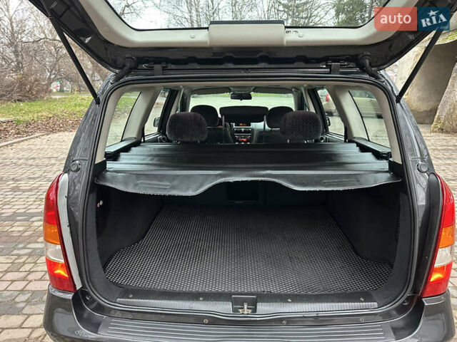 Черный Опель Астра, объемом двигателя 2 л и пробегом 337 тыс. км за 3850 $, фото 92 на Automoto.ua