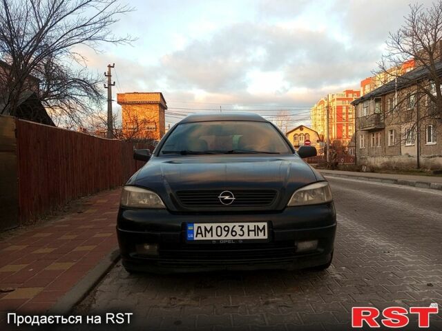 Черный Опель Астра, объемом двигателя 1.7 л и пробегом 300 тыс. км за 3500 $, фото 2 на Automoto.ua