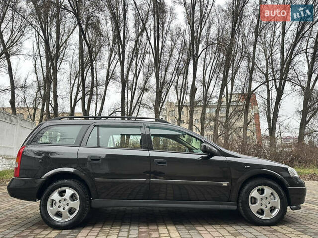 Черный Опель Астра, объемом двигателя 2 л и пробегом 337 тыс. км за 3850 $, фото 14 на Automoto.ua