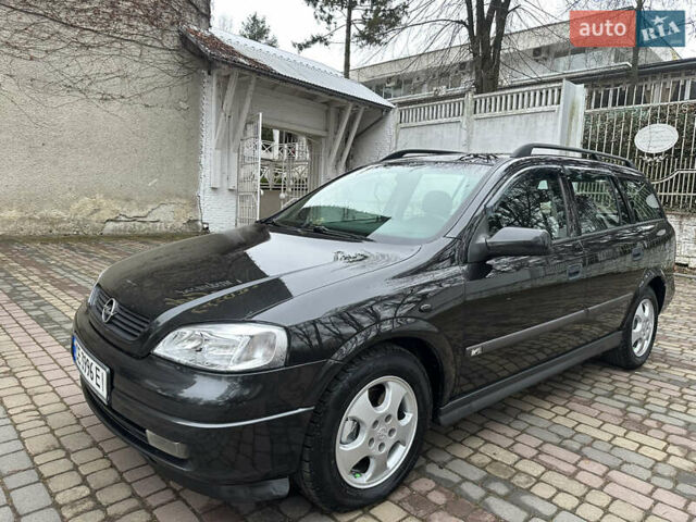 Черный Опель Астра, объемом двигателя 2 л и пробегом 337 тыс. км за 3850 $, фото 2 на Automoto.ua