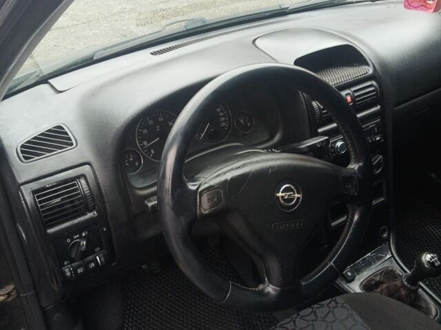 Черный Опель Астра, объемом двигателя 1.6 л и пробегом 350 тыс. км за 2650 $, фото 22 на Automoto.ua