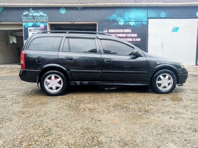 Черный Опель Астра, объемом двигателя 1.6 л и пробегом 350 тыс. км за 2650 $, фото 5 на Automoto.ua