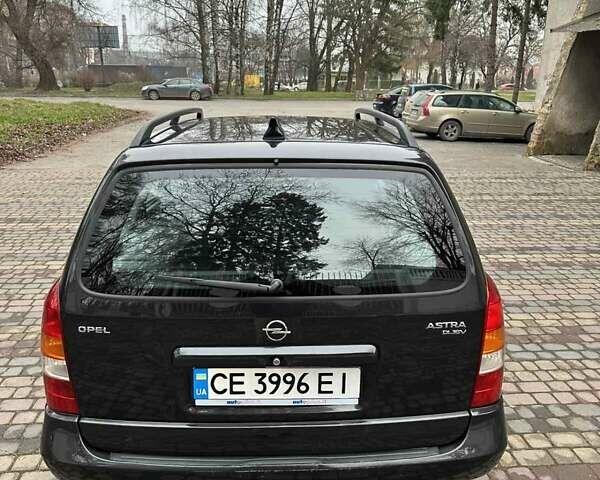 Черный Опель Астра, объемом двигателя 2 л и пробегом 340 тыс. км за 3900 $, фото 22 на Automoto.ua