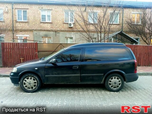 Черный Опель Астра, объемом двигателя 1.7 л и пробегом 300 тыс. км за 3500 $, фото 3 на Automoto.ua