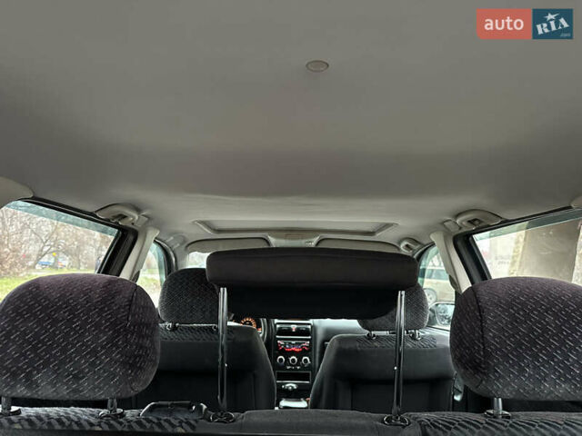 Черный Опель Астра, объемом двигателя 2 л и пробегом 337 тыс. км за 3850 $, фото 94 на Automoto.ua