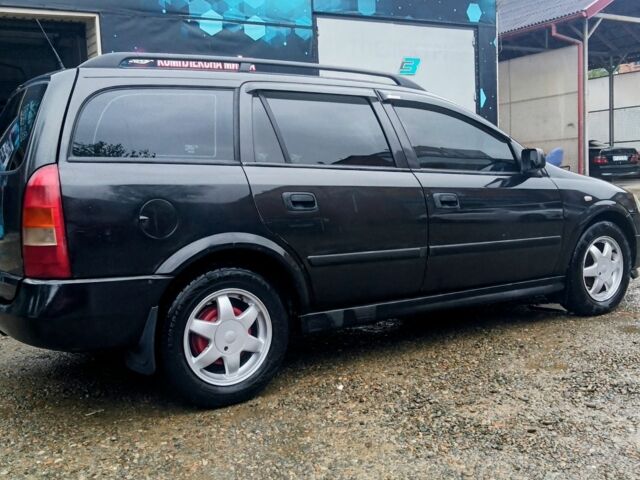 Черный Опель Астра, объемом двигателя 1.6 л и пробегом 350 тыс. км за 2650 $, фото 6 на Automoto.ua