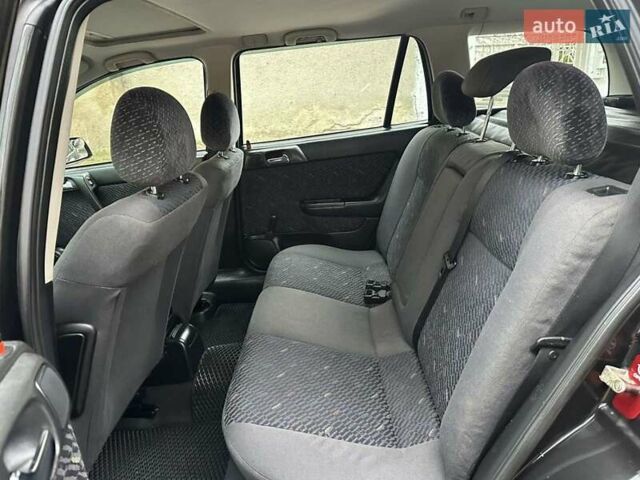 Черный Опель Астра, объемом двигателя 2 л и пробегом 340 тыс. км за 3900 $, фото 63 на Automoto.ua