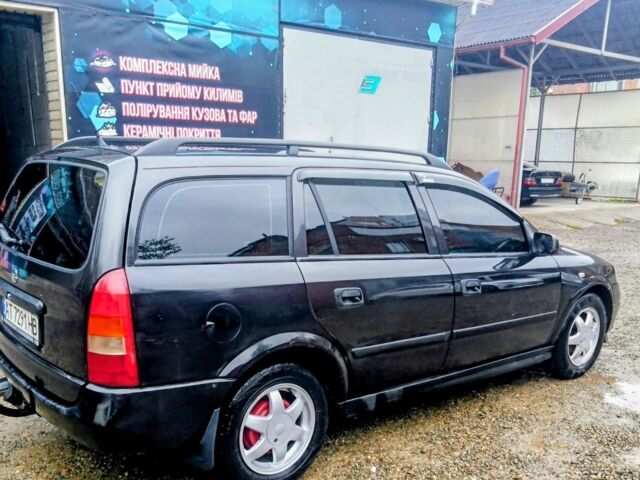 Черный Опель Астра, объемом двигателя 1.6 л и пробегом 350 тыс. км за 2650 $, фото 13 на Automoto.ua