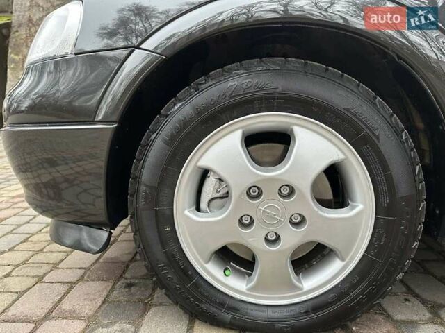 Черный Опель Астра, объемом двигателя 2 л и пробегом 340 тыс. км за 3900 $, фото 24 на Automoto.ua