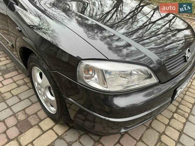 Черный Опель Астра, объемом двигателя 2 л и пробегом 340 тыс. км за 3900 $, фото 27 на Automoto.ua