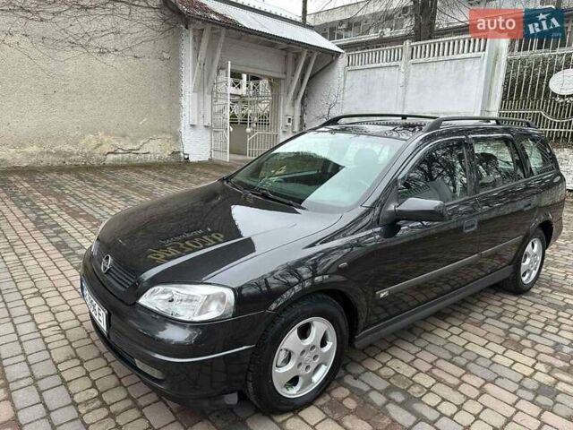 Черный Опель Астра, объемом двигателя 2 л и пробегом 340 тыс. км за 3900 $, фото 4 на Automoto.ua