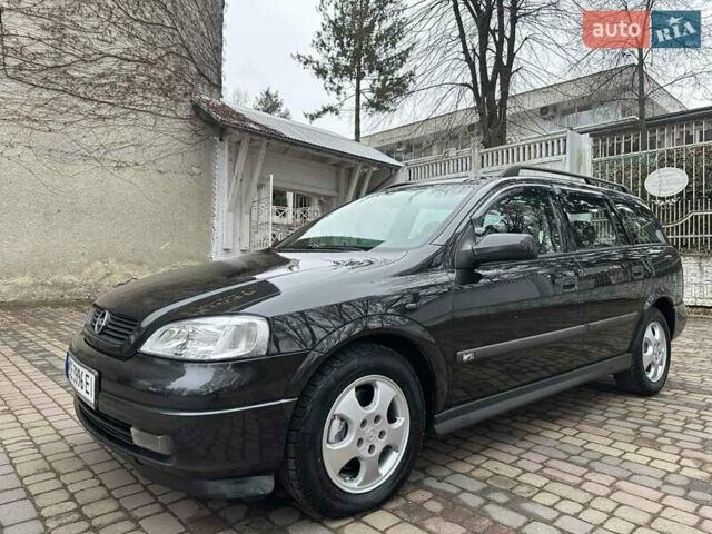 Черный Опель Астра, объемом двигателя 2 л и пробегом 340 тыс. км за 3900 $, фото 3 на Automoto.ua