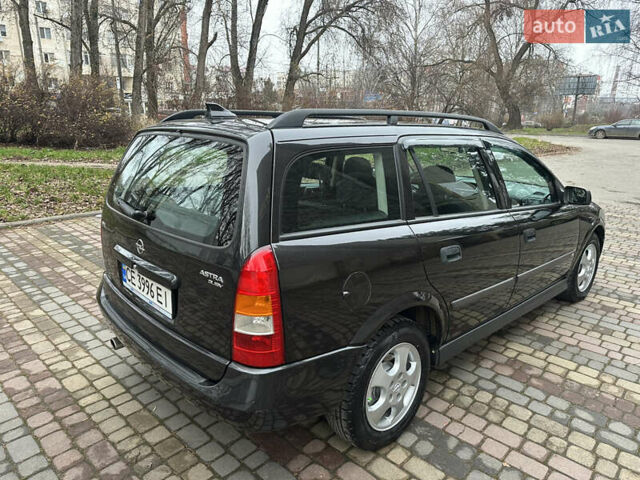 Черный Опель Астра, объемом двигателя 2 л и пробегом 337 тыс. км за 3850 $, фото 16 на Automoto.ua