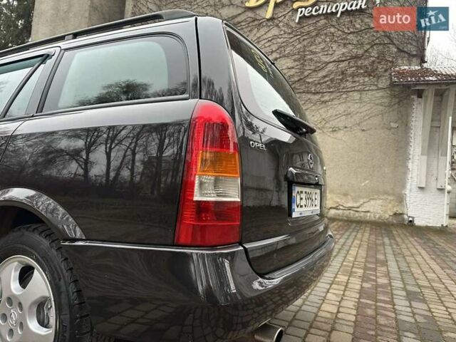 Черный Опель Астра, объемом двигателя 2 л и пробегом 340 тыс. км за 3900 $, фото 34 на Automoto.ua