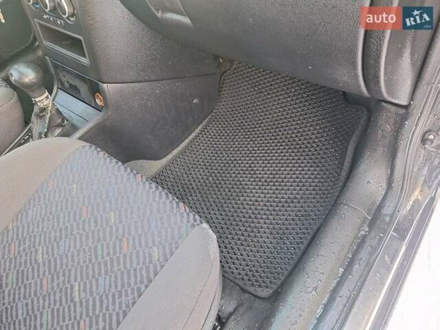 Черный Опель Астра, объемом двигателя 2 л и пробегом 340 тыс. км за 3650 $, фото 32 на Automoto.ua