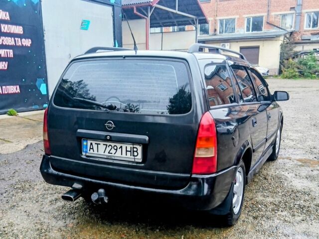 Черный Опель Астра, объемом двигателя 1.6 л и пробегом 350 тыс. км за 2650 $, фото 10 на Automoto.ua