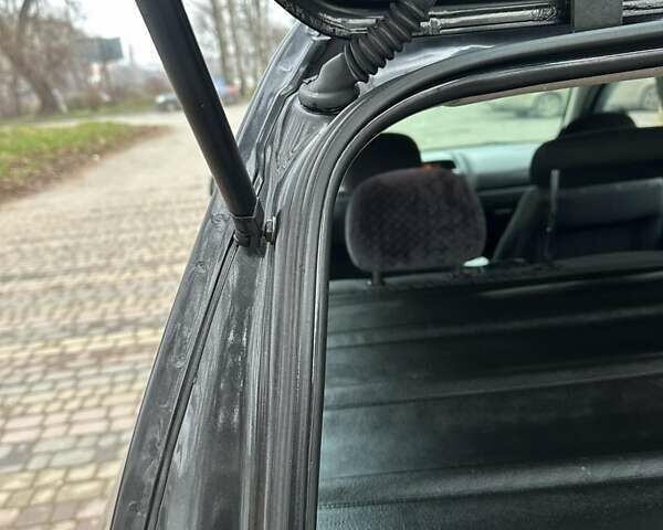 Черный Опель Астра, объемом двигателя 2 л и пробегом 340 тыс. км за 3900 $, фото 103 на Automoto.ua