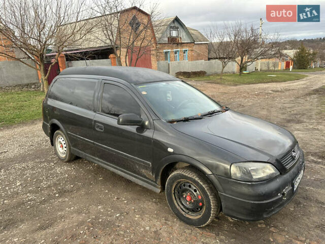 Черный Опель Астра, объемом двигателя 1.7 л и пробегом 300 тыс. км за 1200 $, фото 1 на Automoto.ua