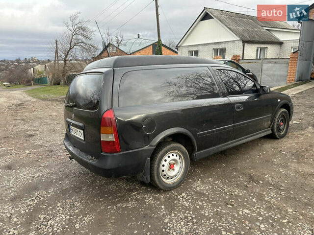 Черный Опель Астра, объемом двигателя 1.7 л и пробегом 300 тыс. км за 1200 $, фото 2 на Automoto.ua